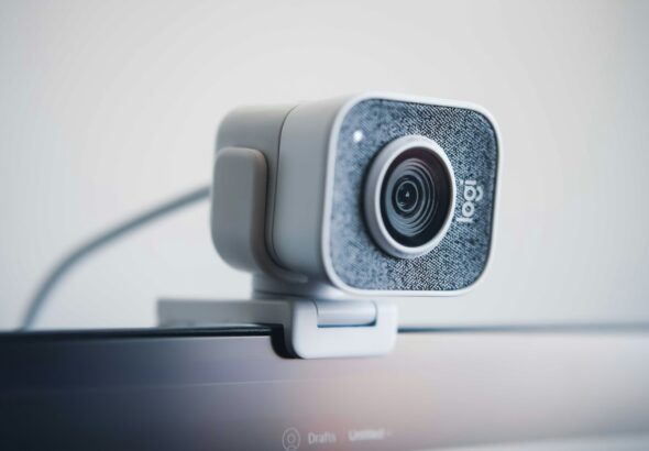 black and silver speaker on white table